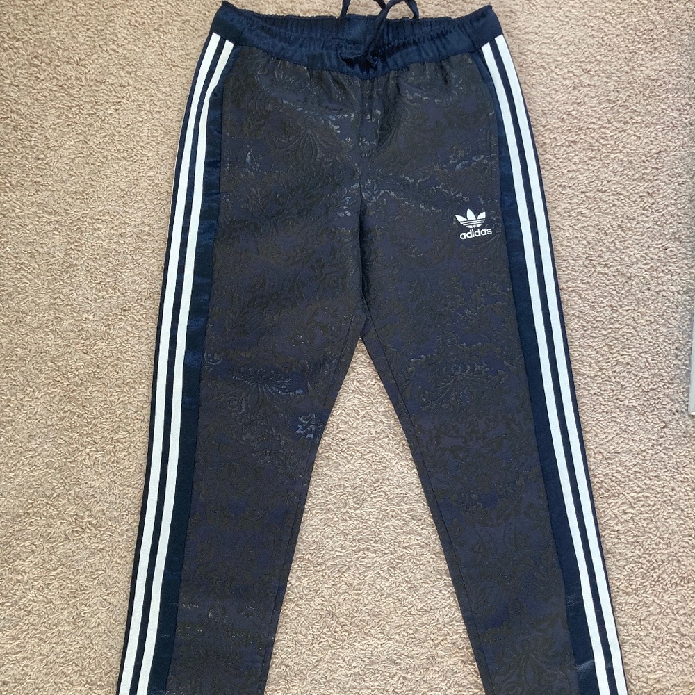 Vintage Adidas joggers with embroidered design